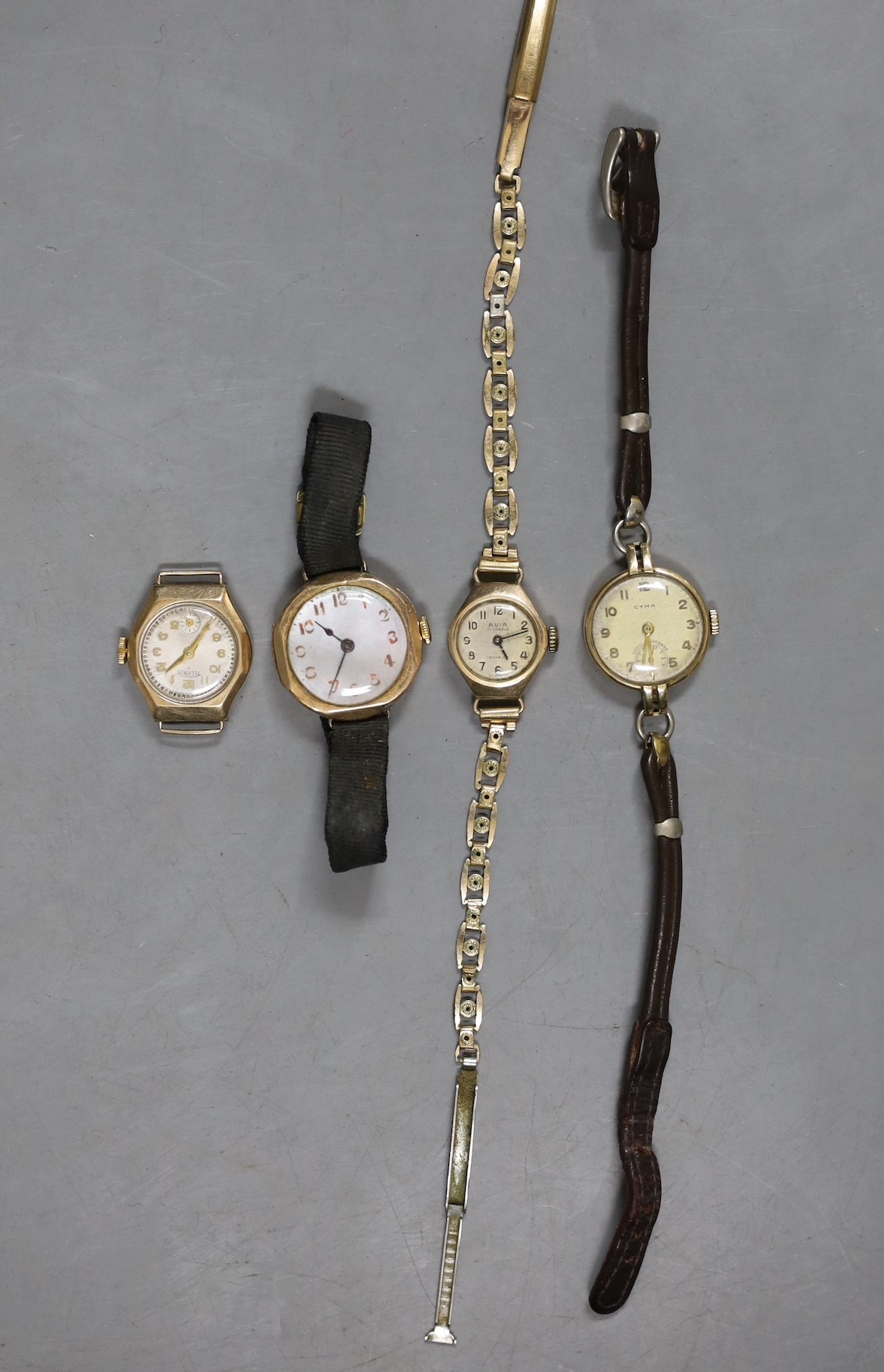 Four lady's assorted yellow metal manual wind wrist watches, including Cyma and Avia, two stamped 9ct gold.